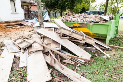 Construction site with accumulated debris awaiting clearance in East Ham