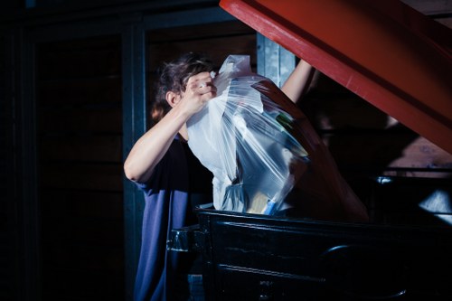 Workers sorting construction debris for recycling