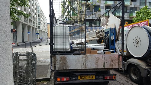 Workers processing recyclable materials in East Ham